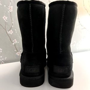 UGG black size 7. Worn one time. Great condition